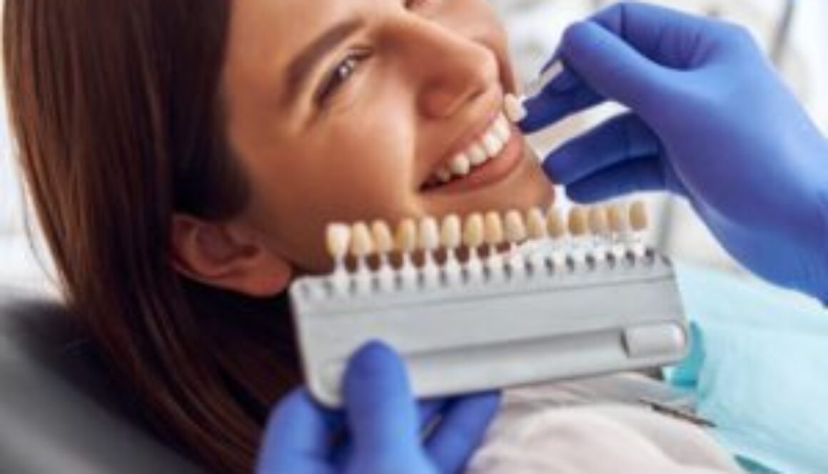 male-doctor-stand-upon-client-put-artificial-teeth-true-ones-whitening-procedure-tooth-replacing-min male-doctor-stand-upon-client-put-artificial-teeth-true-ones-whitening-procedure-tooth-replacing-min